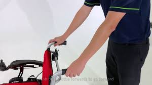 Pushing and Using Attendant Control for Ultra-Lite Electric Wheelchair - Falcon Mobility Singapore