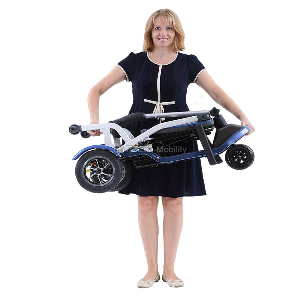 F2 Lightweight Foldable Electric Mobility Scooter PMA - Lady carrying